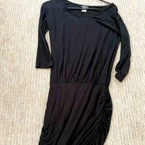 Venus black long sleeve dress with side ruching at the bottom sides size XS